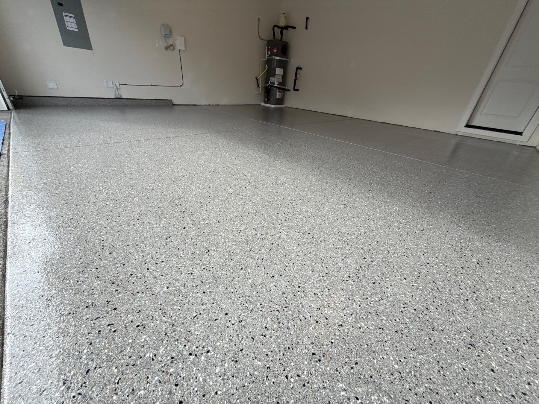 Light gray flake garage floor from a low angle